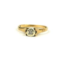A 9CT GOLD AND DIAMOND GYPSY SET RING. (UK size N, 2.1g)