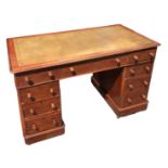 A 19TH CENTURY VICTORIAN MAHOGANY PEDESTAL DESK Green tooled leather top above nine drawers,