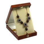 A NECKLACE SET WITH CABOCHON GARNETS, SQUARE CUT GARNETS, SEED PEARLS AND DIAMONDS, boxed.