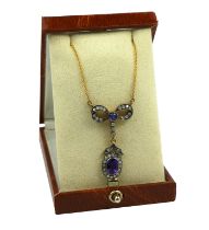 A BOW STYLE NECKLACE SET WITH AMETHYSTS AND DIAMONDS, Boxed.