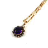 A VICTORIAN YELLOW METAL, AMETHYST AND DIAMOND PENDANT, TOGETHER WITH A 15CT GOLD TROMBONE LINK