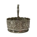 THOMAS HAYES, A SILVER SWING HANDLE BASKET Sides embossed with a relief scene, depicting Dionysian