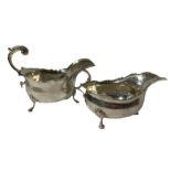 TWO SILVER SAUCE BOATS, BOTH RAISED UPON THREE SPADE FEET First assayed Cooper Brothers & Sons
