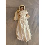 ARMAND MARSEILLE, AN EARLY 20TH CENTURY GERMAN BISQUE DOLL Dressed in gown and headdress, 370