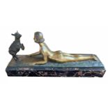 JOSEPH D'ASTE, AN ART DECO BRONZE STATUE OF A NUDE FEMALE WITH LAMB Raised on a marble base,