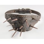 A 19TH CENTURY IRON SPIKED HUNTING DOG COLLAR. Used to protect the dog's throat from wolves and