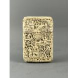 A FINE CANTON IVORY CARD CASE, C. 1860. Well carved with figures among garden pavilions and