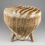 A 20TH CENTURY ZEBRA DRUM TABLE. With glass top (slightly smaller than diameter of drum). (h 50cm