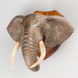 TERRY OWEN MATHEWS, AFRICAN ELEPHANT SCULPTURE UPON HARDWOOD PLAQUE. Circa 1960. A scarce early work