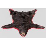 A LATE 20TH CENTURY TAXIDERMY BLACK BEAR SKIN RUG WITH MOUNTED HEAD. With CITES Export Permit. (l