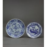 Two blue and white Dishes, Qing dynasty the larger W: 27.5cm The larger with penciled floral