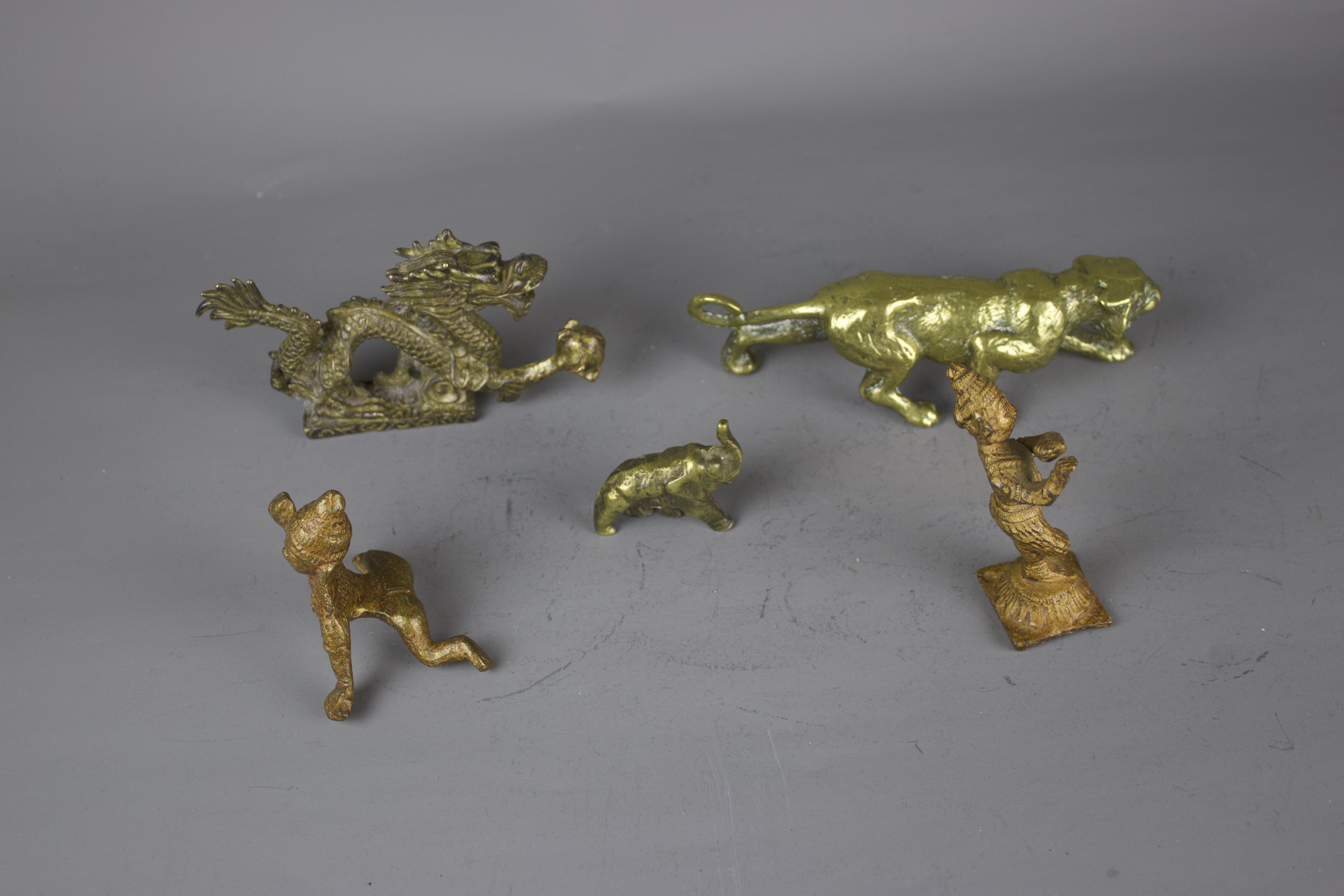 A group of metal figures, 19th / 20th century W: 15cm The heavy brass cast dragon on a plinth is - Image 4 of 4