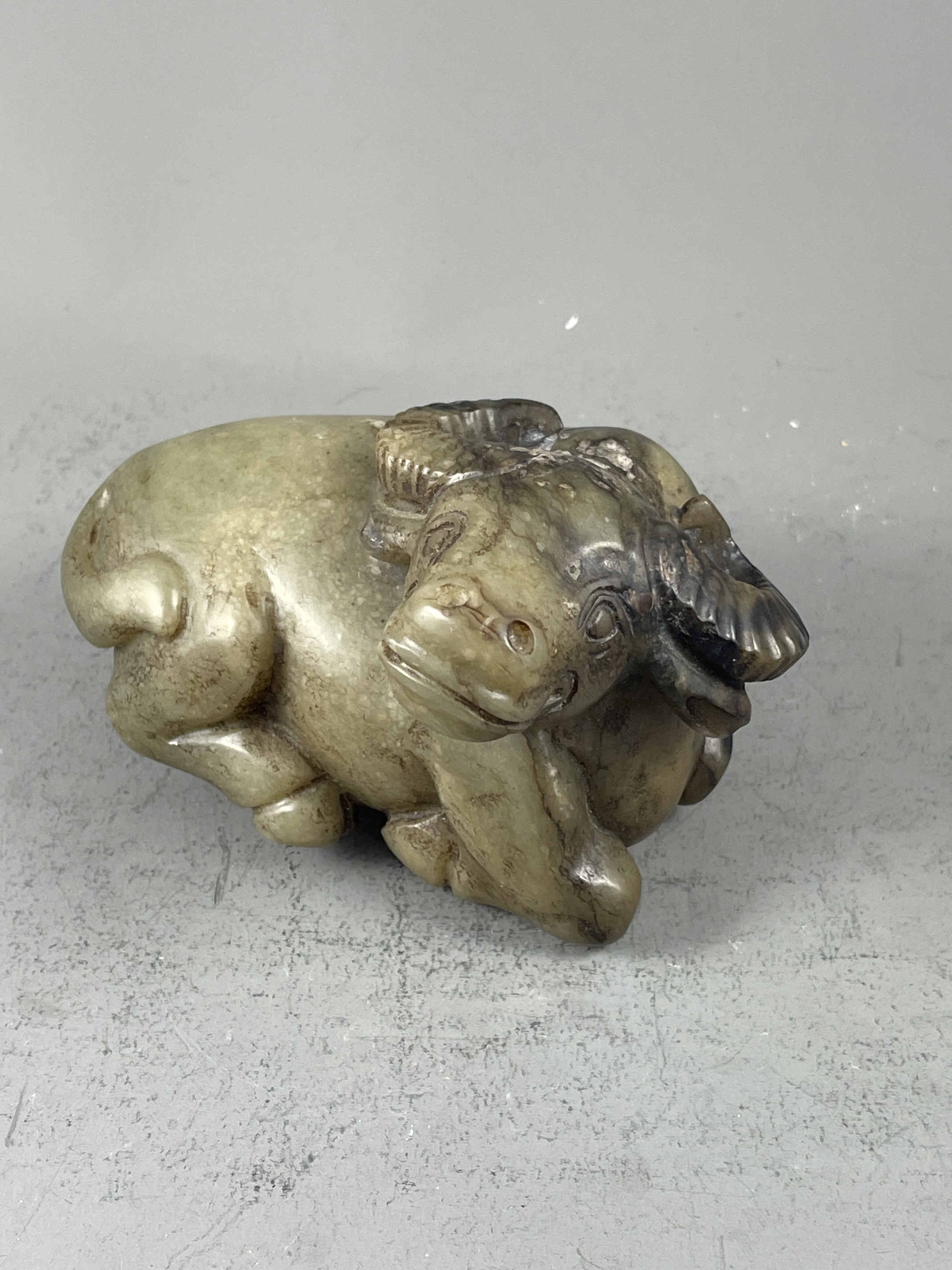 A Jade seated Buffalo, c. 1920 in Ming style H: 5cm w: 9cm A Jade seated Buffalo, c. 1920 in Ming - Image 10 of 10