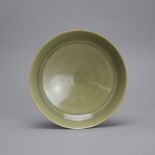 A Fine Yaozhou celadon shallow bowl, Northern Song dynastyW: 16.2cm, H: 4.5cm FROM A PRIVATE