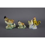 Three groups of well crafted Chinese porcelain chicken figures, 20th century. H:12cm Two groups