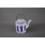 A rare Chinese blue and white teapot, early 20th century. H:15cm An unusual early printed pattern