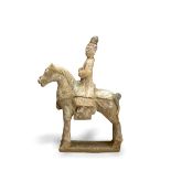 A pottery Equestrienne Group, Ming dynasty H: 34.5cm, W: 23.5cm PROPERTY FROM THE COLIN HART