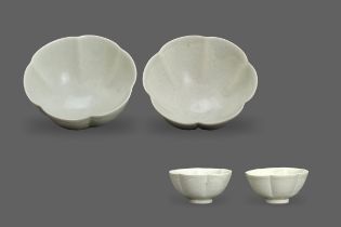 A Pair of petal lobed Qingbai Winecups, Song dynastyW: 9.5cm, H: 4.5cm PROPERTY FROM THE COLIN