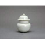 An unusual small Qingbai Jar and Cover, Southern Song dynastyH: 9cm, W: 7cm PROPERTY FROM THE