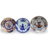 A blue and white Plate, and Two Chinese Imari Dishes, 18th Century. The largest W: 25cm The blue and