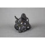 A high quality bronze buddha statue, 19th / 20th century. H: 15cm This figure is widely known as “Bu