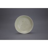 A Good moulded Dingyao Dish, Northern Song dynastyW:14.5cm FROM A PRIVATE COLLECTION A Good
