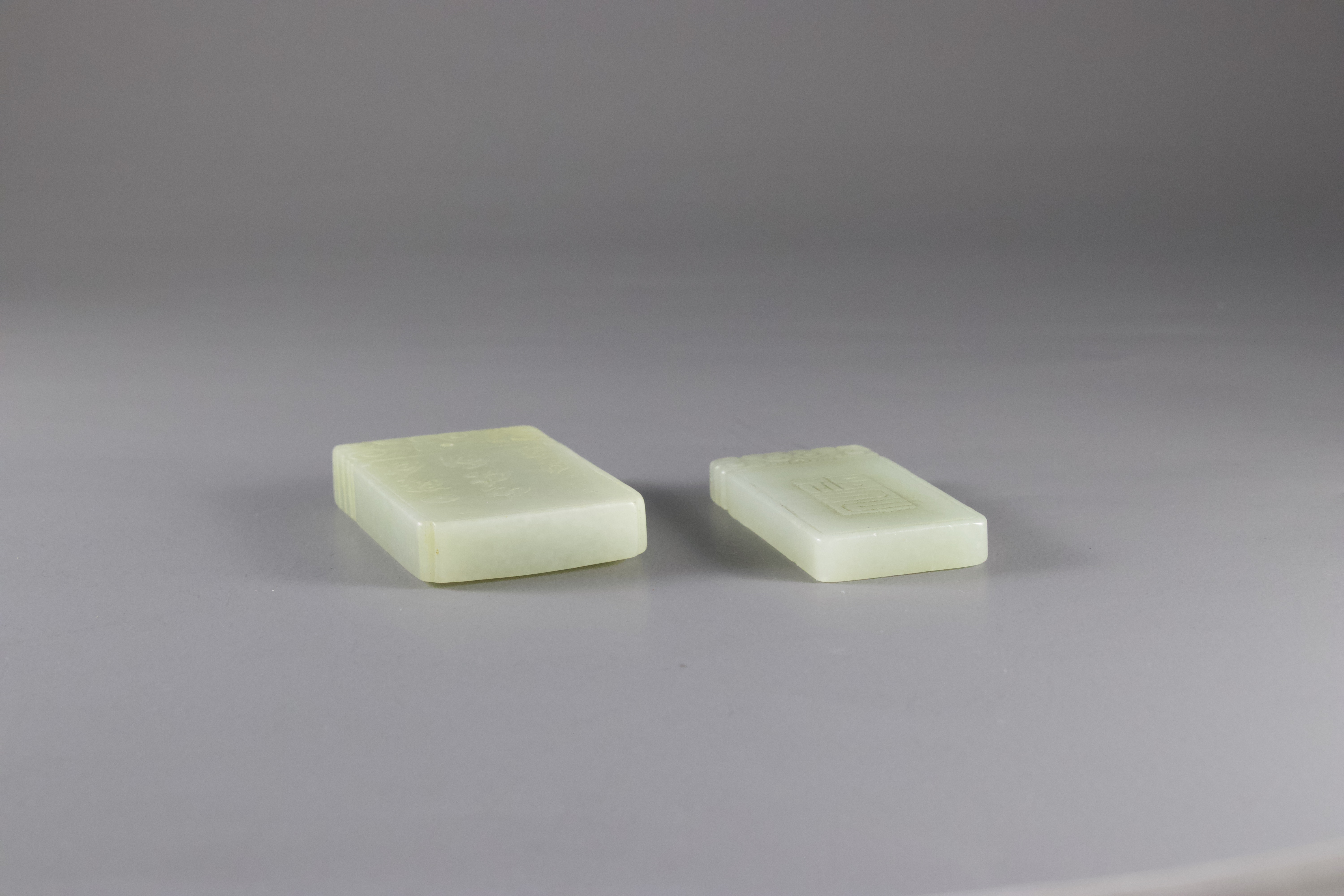 A celadon Jade rectangular Kylin Plaque, and Another, with a sage in a gardenH: 5.2cm and H: 5.5cm - Image 6 of 6