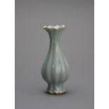 A fluted Miniature Celadon Vase in Song style H: 10.2cm Of finely potted slender ‘cabbage’ form with