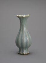 A fluted Miniature Celadon Vase in Song style H: 10.2cm Of finely potted slender ‘cabbage’ form with