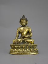 A Gilt Bronze seated Buddha, 16th /17th centuryH: 9.6cm A Gilt Bronze seated Buddha, 16th /17th