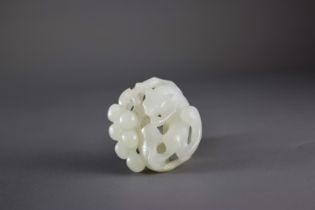 A White Jade Tree Shrew and Grapes Pendant, 18th CenturyW: 4.1cm, H: 2cm A White Jade Tree Shrew and