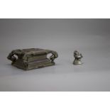 An Indian bronze Stand, and an Opium Weight, 19th century or earlierthe stand W: 14cm the weight