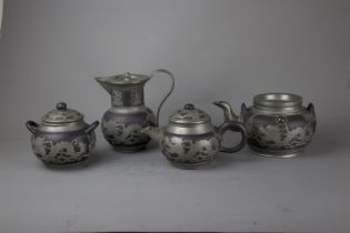 A high quality Yixing Zisha tea set , 19th/20th C. H: 15cm Includes a coffee pot, a tea pot, a