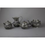 A high quality Yixing Zisha tea set , 19th/20th C. H: 15cm Includes a coffee pot, a tea pot, a