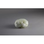 A grey and celadon Jade 'Cats' Group, 19th Century W: 5.2cm, H: 1.5cm A grey and celadon Jade 'Cats'