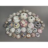 A set of 39 polychrome lids, mostly 18th century Including a number in good condition