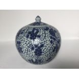 A blue and white porcelain jar, early 20th C. H: 21cm Decorated with floral in eight sections
