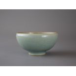A Celadon Winecup, Song Dynasty or laterW: 8.5cm A Celadon Winecup, Song dynasty or later covered in