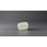 A White Jade Abstinence Plaque, Qing Dynasty or laterH: 4.5cm A White Jade Abstinence Plaque, Qing