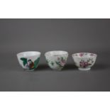 Three Chinese famille rose tea cups, 18th - 20th century respectively. H: 5/6cm One has flower