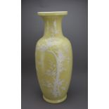 A large yellow and white decorated Rouleau Vase, 20th century H: 61cm, W :23cm Well decorated in
