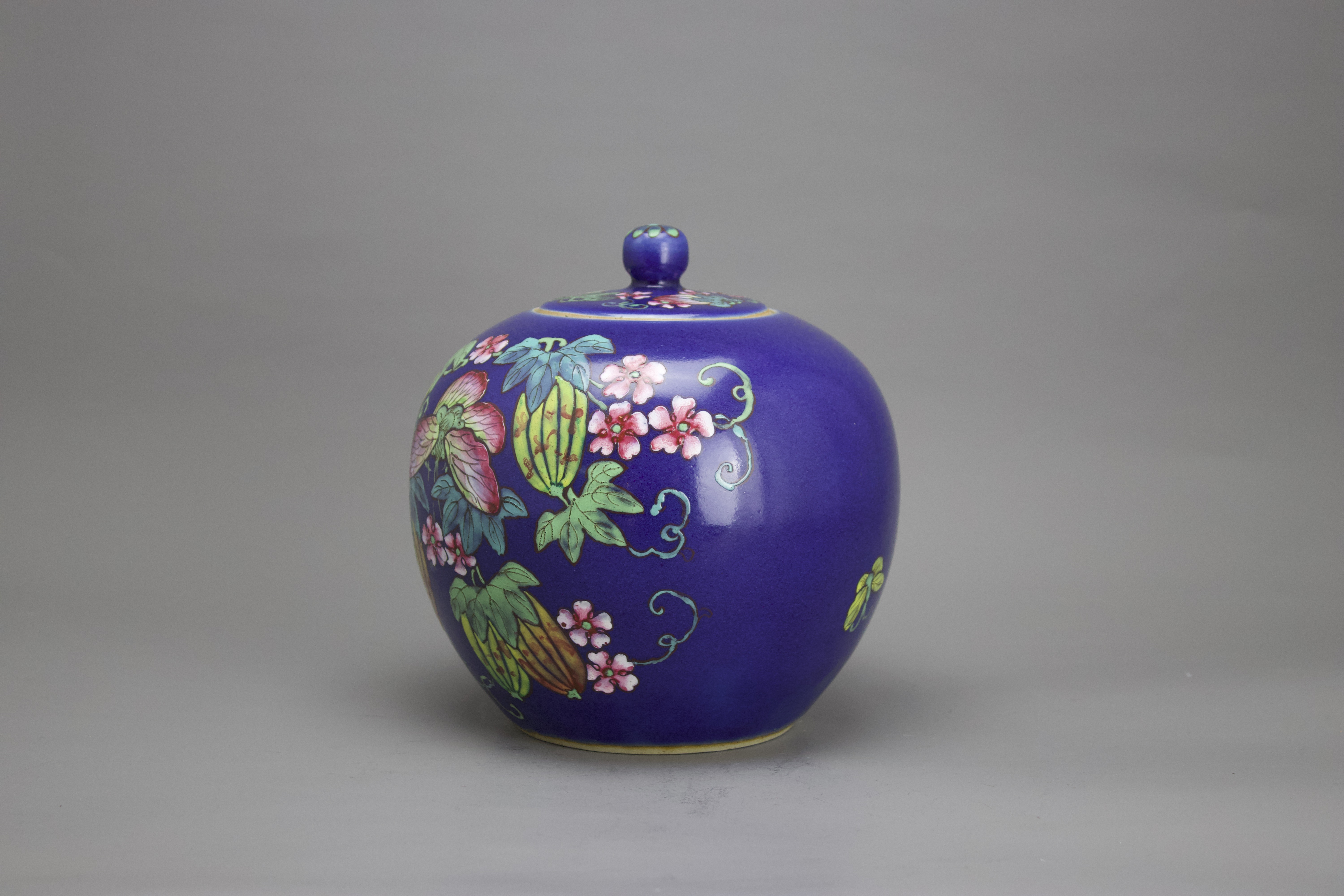 A blue ground 'famille rose' Jar and Cover, c. 1900 H: 19.5cm of globular form, decorated with gourd - Image 2 of 7