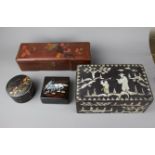 Four oriental lacquer wooden boxes, 19th / 20th century. Size: 30X10X8 cm The bigger pair: One is