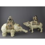 An Amusing Pair of Satsuma Beasts with Riders c. 1900 The elephant W:38cm H:26cm The buffalo W: