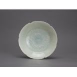 A petal rimmed carved Qingbai Dish, Song dynastyH: 3.6cm, W:15.5cm A petal rimmed carved Hutian