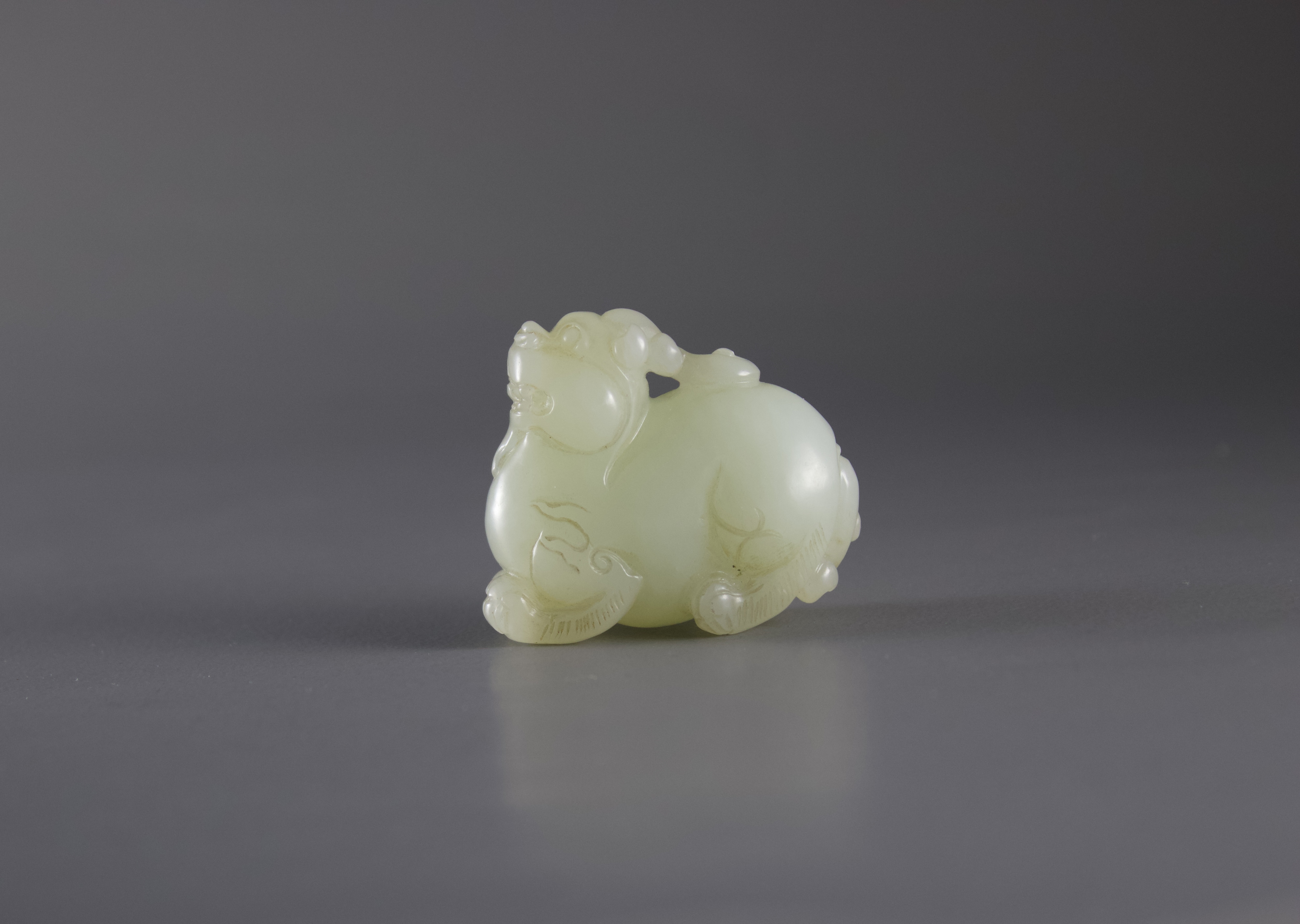 A Jade Qilin Pendant, Qing Dynasty or laterL: 4.5cm A Jade Qilin Pendant, Qing dynasty or later Well