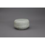 A Qingbai chrysanthemum moulded box and cover, Song/Yuan DynastyW: 12cm, H: 7cm PROPERTY FROM THE