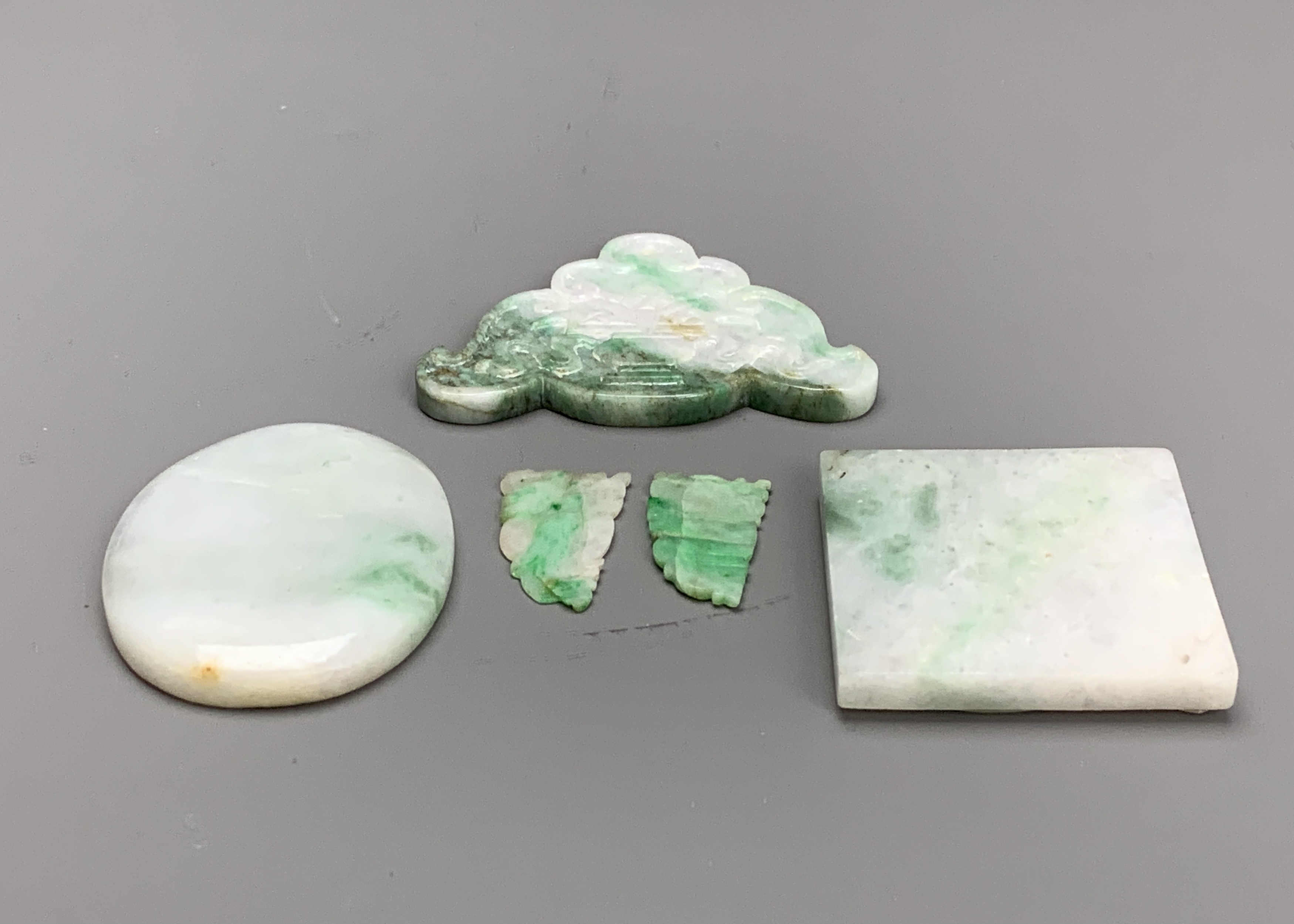 A group of jadeite carvings, c. 1900 From top to bottom, left to right: L 51cm W 47cm L 24cm W 14. - Image 4 of 4