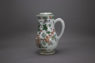 A 'famille verte' Jug and Cover, Kangxi Period, Qing DynastyH: 24cm, W: 16cm A 'famille verte' Jug