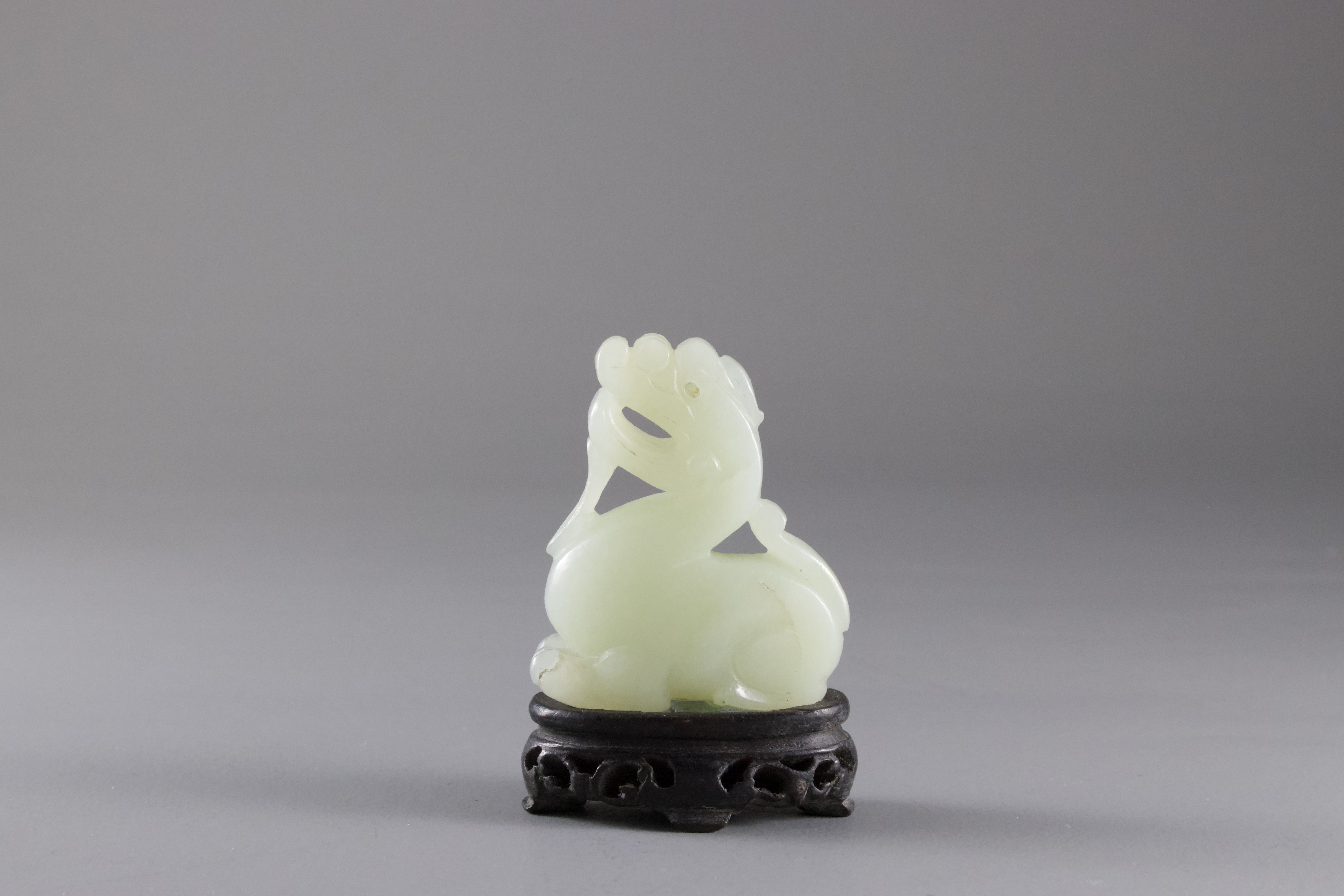 A celadon Jade Fabulous Animal, 18th /19th CenturyH: 5cm A celadon Jade Fabulous Animal, 18th /